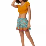 Mini-jupe à pompons, Bleu turquoise imprimé végétal - JIP0036A